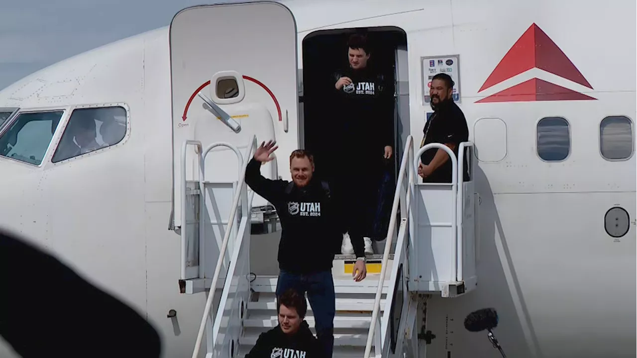 PHOTOS: Utah's new NHL team greeted by youth hockey players at Salt Lake airport