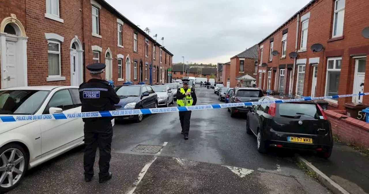 LIVE: Police 'swarm' Oldham road with cordon in place