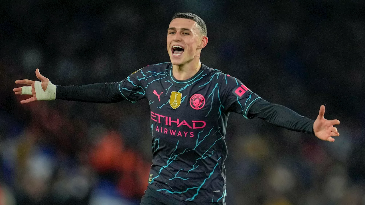 Foden scores twice as Man City beats Brighton to stay on course for another Premier League title