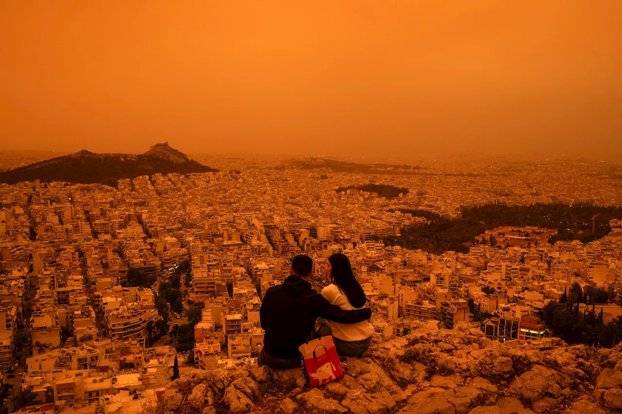 Skies turn orange over Athens as hot Saharan dust sweeps Mediterranean