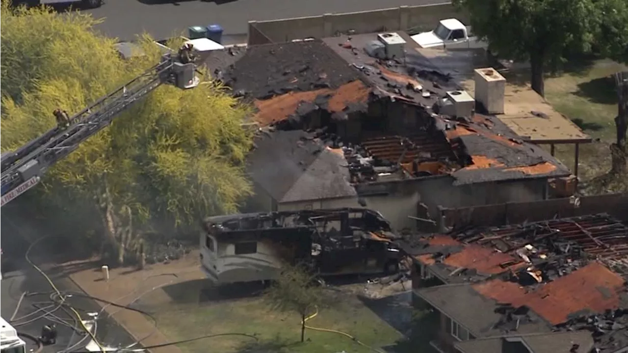 Windy conditions spread fire to numerous houses in Mesa