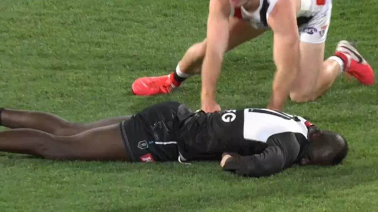 Port Adelaide defender Aliir Aliir subbed out after nasty Jack Higgins tackle leaves him concussed