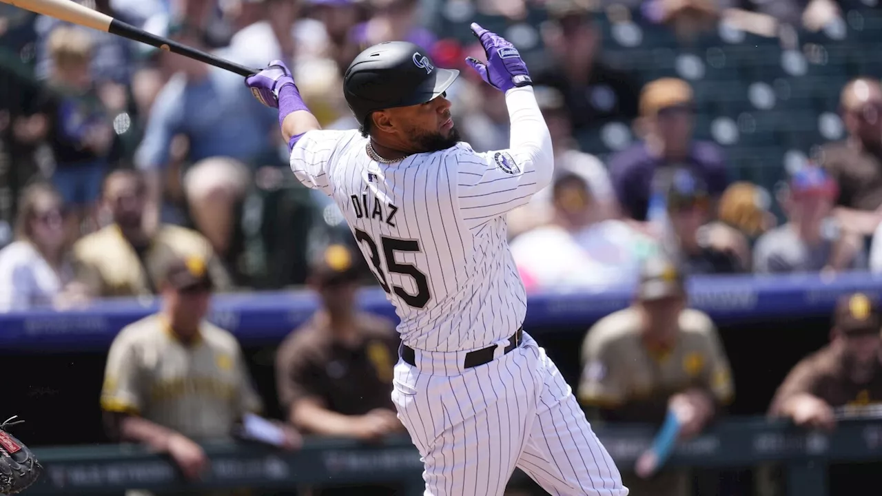 Elias Díaz gets key hit as the Rockies rally for a wild 10-9 victory over the Padres