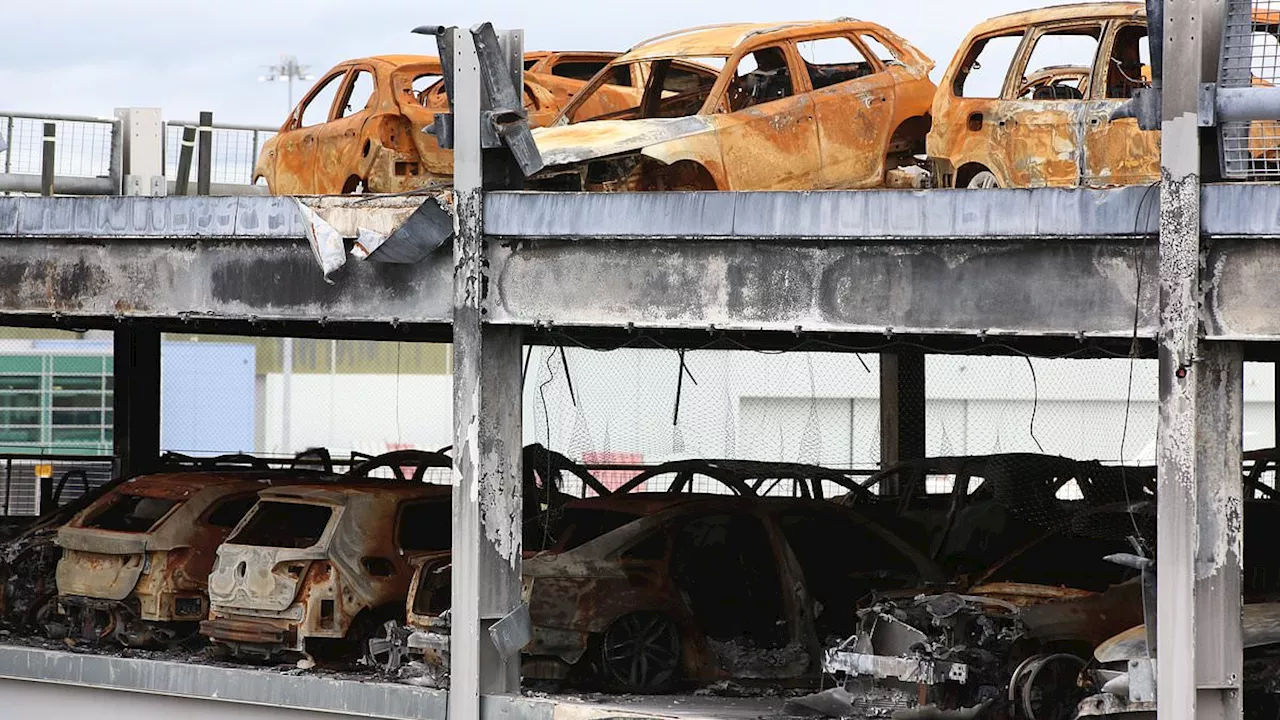 Hundreds of burnt out motors are still stranded at Luton Airport car park six months after...