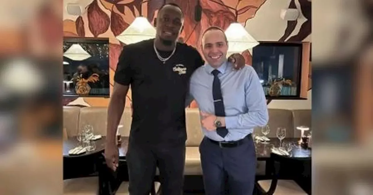 Usain Bolt spotted at Bolton restaurant with ex-Premier League star