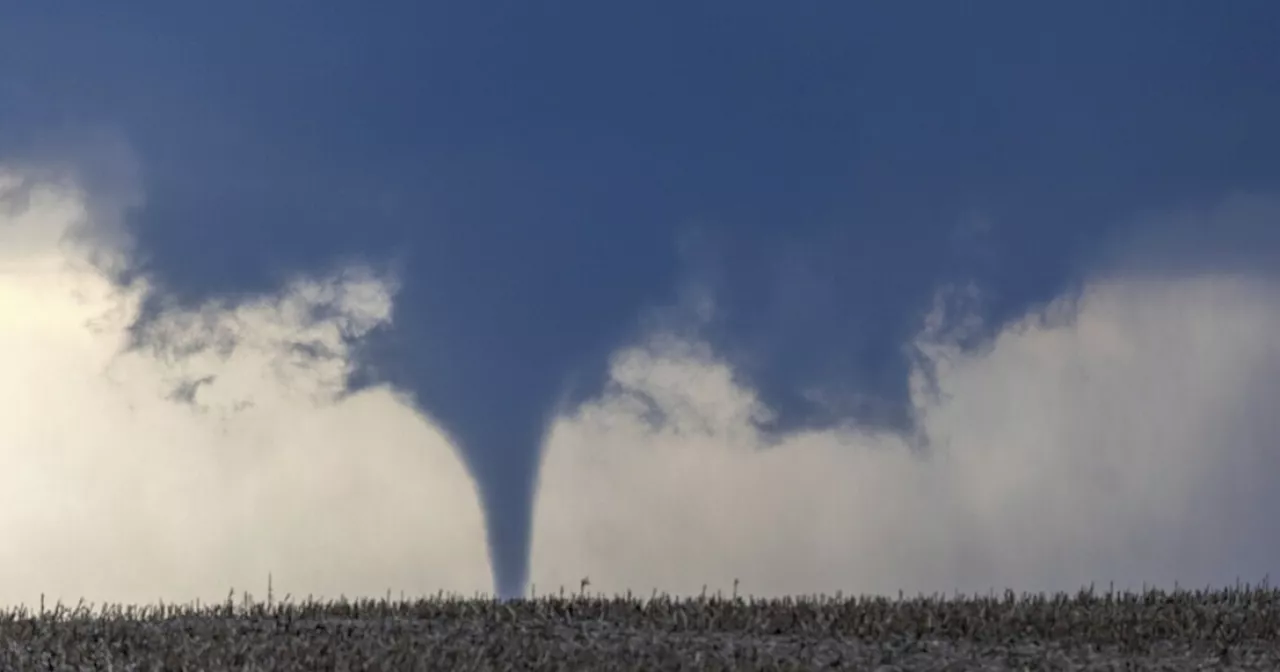 Tornadoes collapse buildings and level homes in Nebraska and Iowa