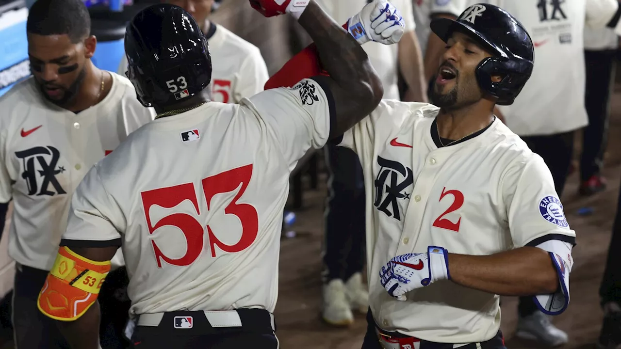 Marcus Semien homers to break 8th-inning tie, Rangers beat Reds 2-1