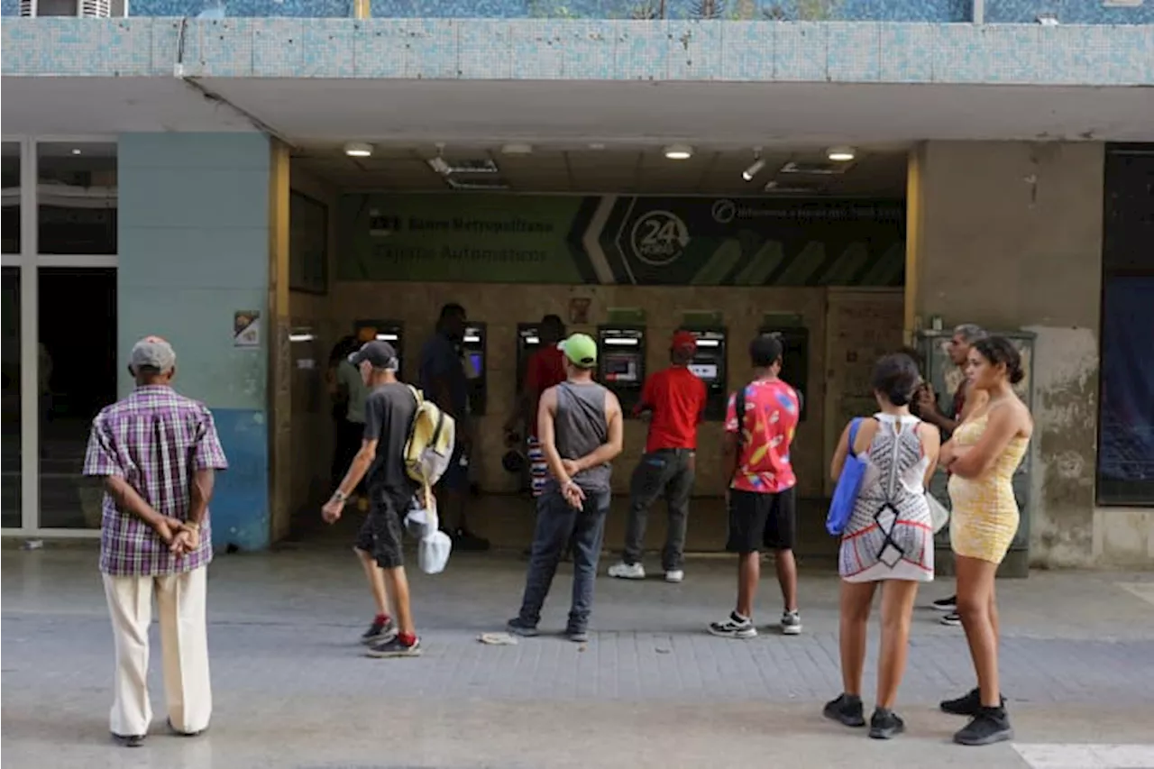 Long lines form and frustration grows as Cuba runs short of cash