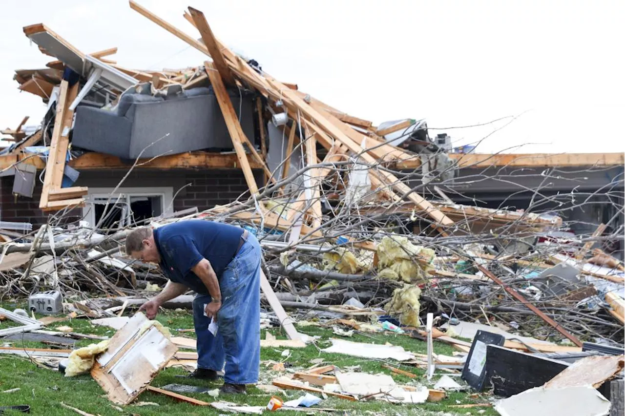 Residents begin going through the rubble after tornadoes hammer parts of Nebraska and Iowa