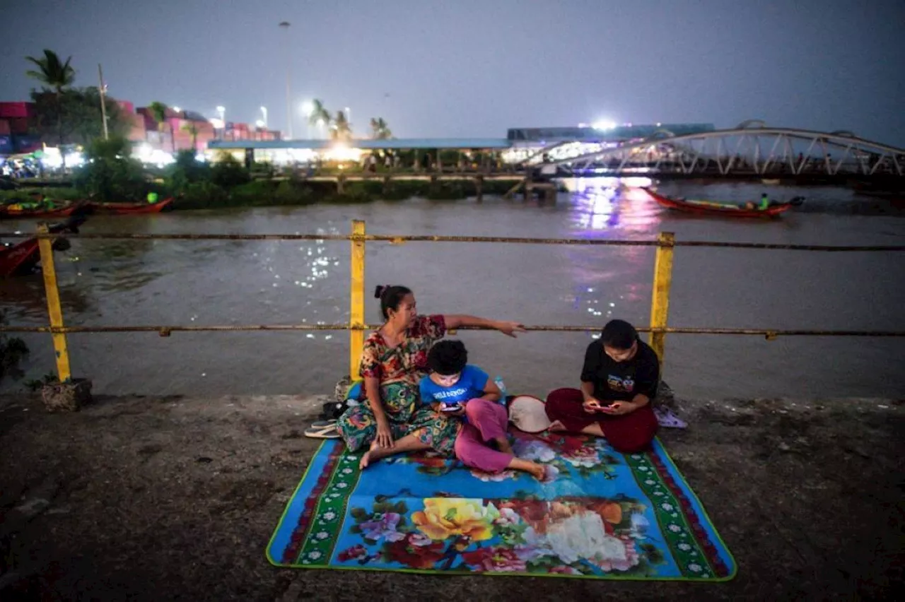 'Everyone sits out': Yangon parks offer heatwave relief