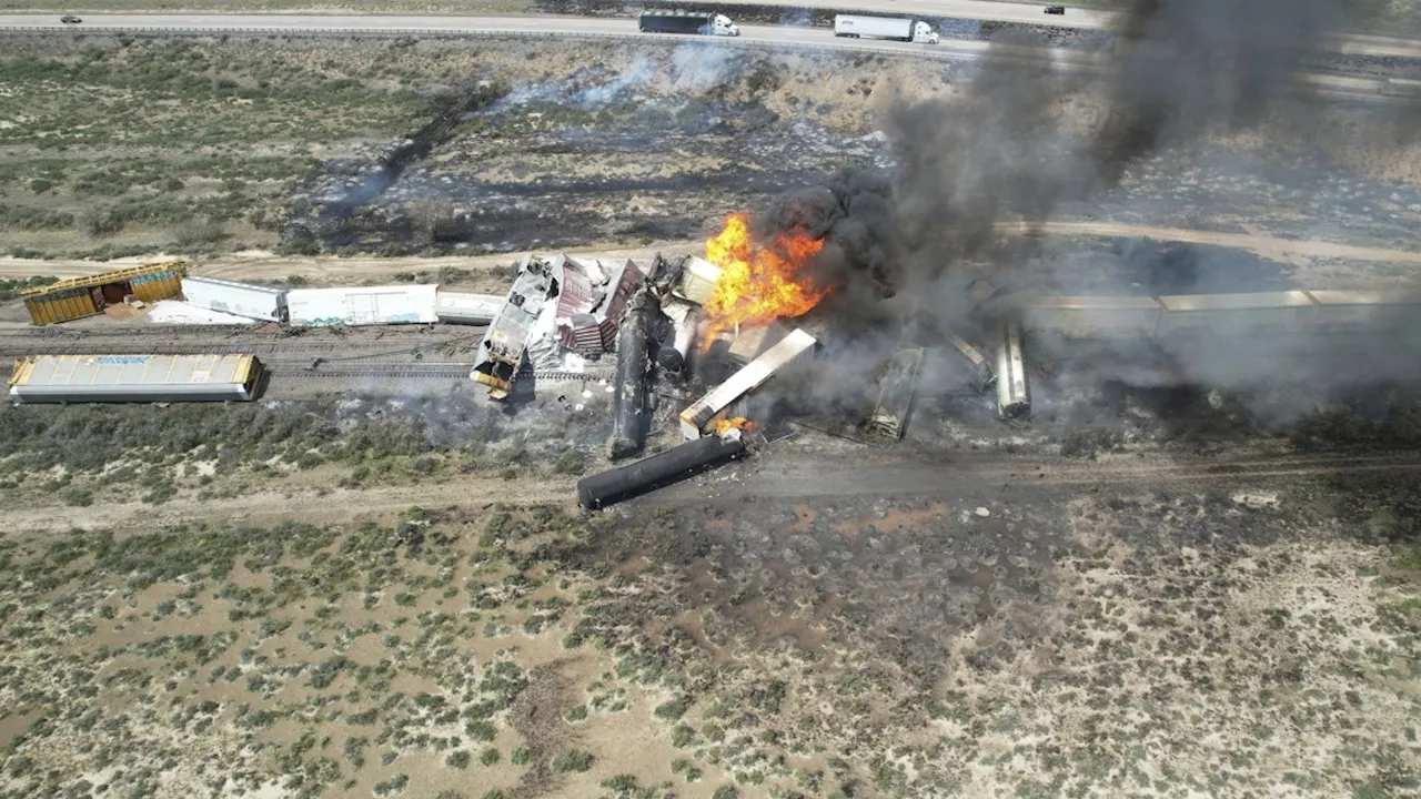 Freight train derailment, fire forces Interstate 40 closure