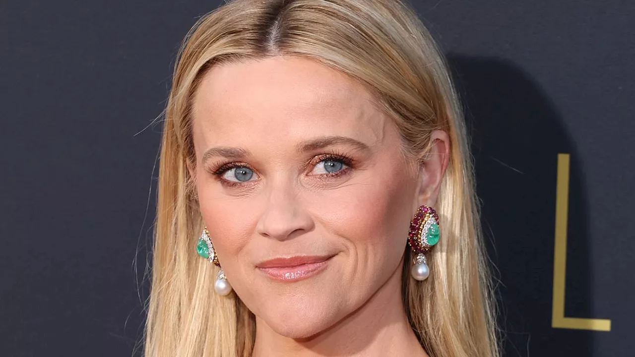 Reese Witherspoon looks every bit glamourous supporting Big Little Lies co-star Nicole Kidman as she...