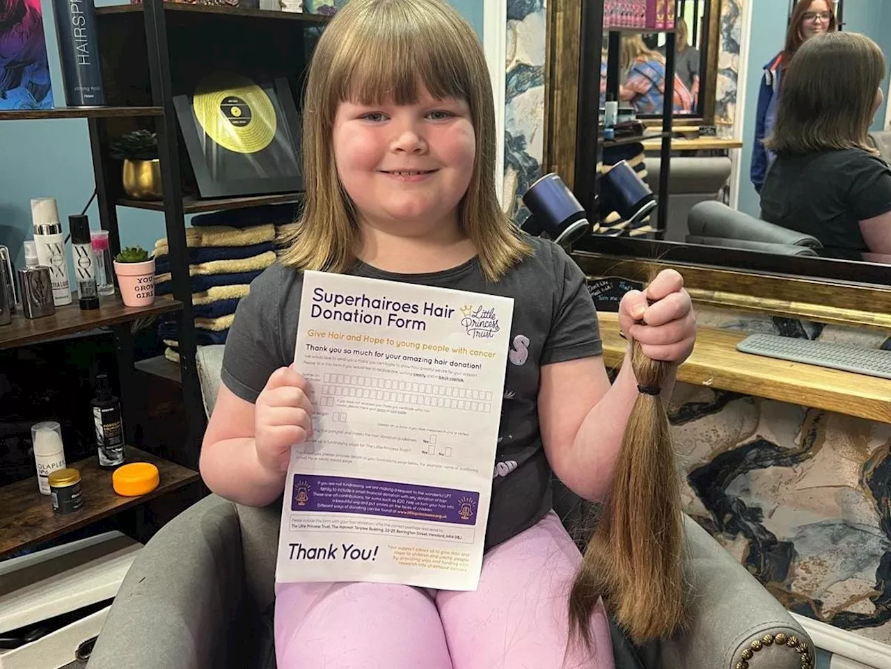 Telford schoolgirl, 7, raises over £500 with 10-inch charity chop for Little Princess Trust