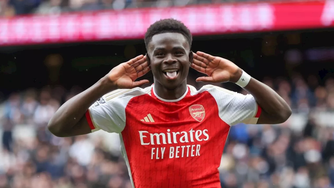 Arsenal survive Spurs fightback to extend lead in Premier League title race
