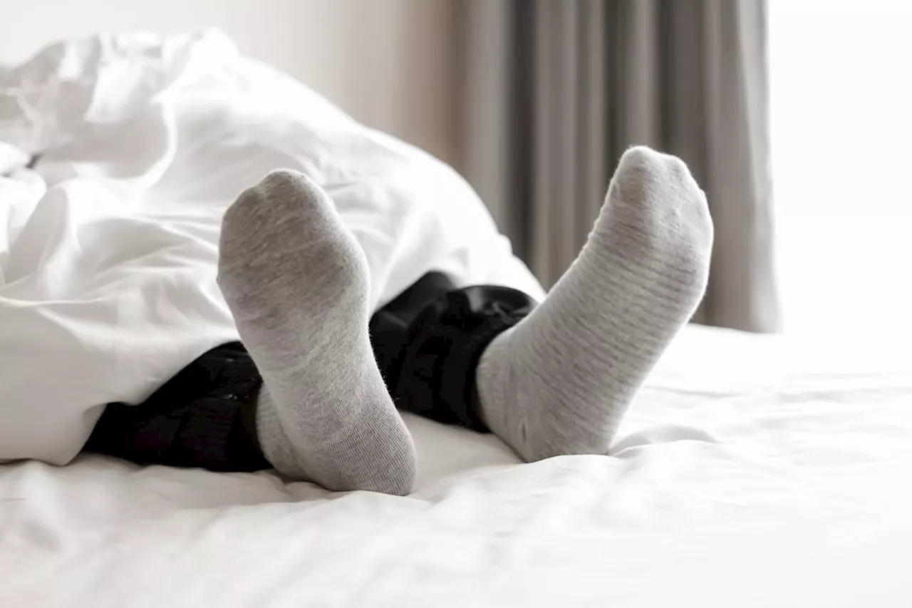 Should you sleep in socks? Experts say this hack might be the secret to falling asleep faster and waking up less