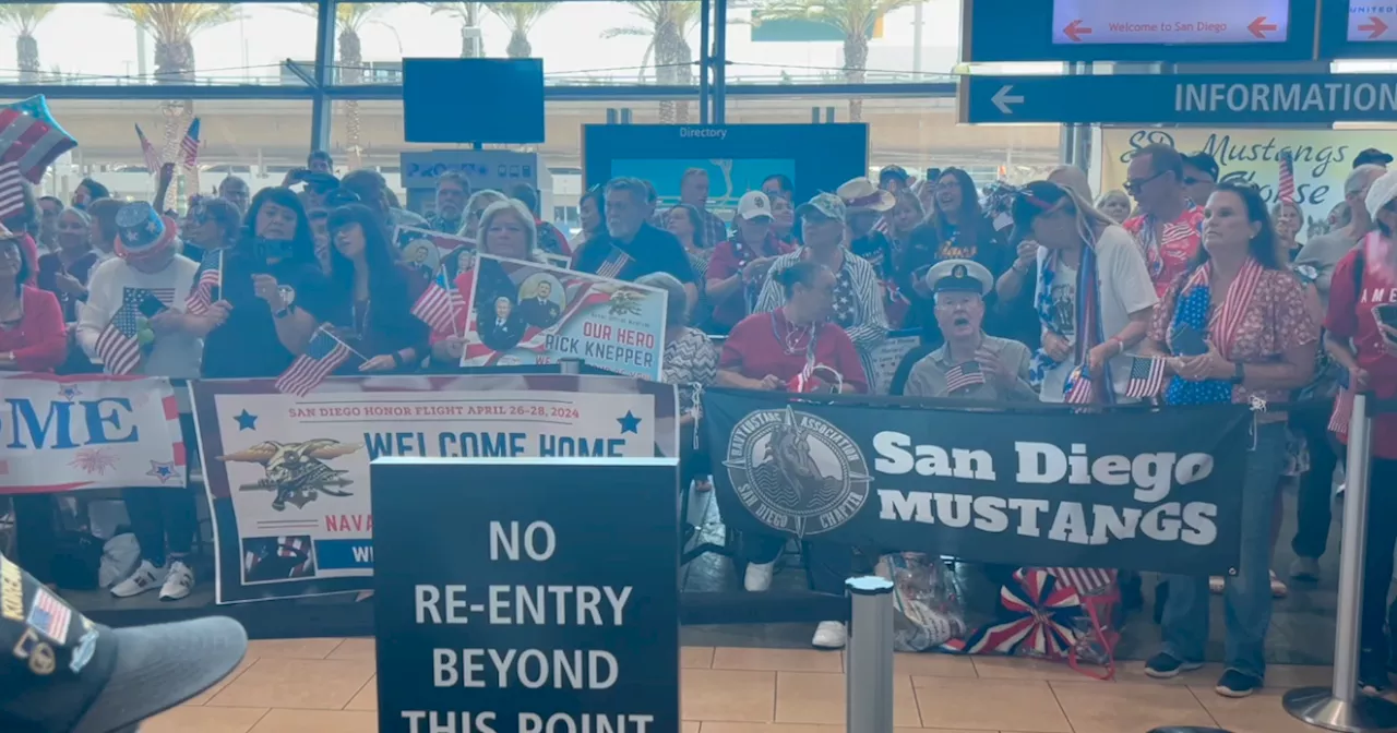 Combat veterans welcomed home in surprise reunion at San Diego Airport