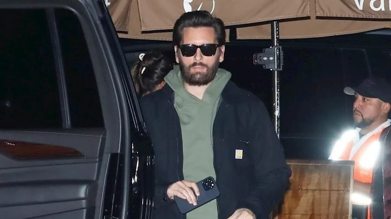 Scott Disick sports sunglasses at night as he emerges for dinner at Nobu restaurant