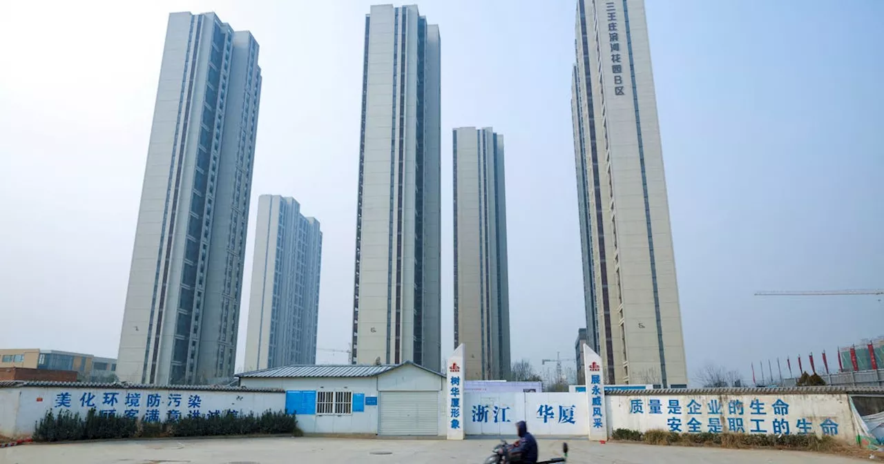 Strained Chinese cities struggle to pay home buying subsidies