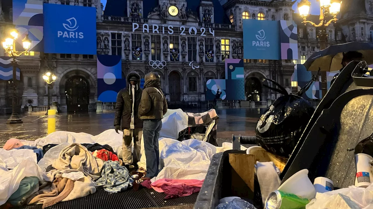 Police remove migrants from central Paris square ahead of the Olympics