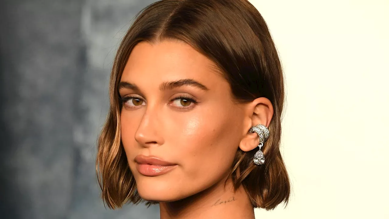 Hailey Bieber's Manicure Looks More Like Big Pink Pearls Than Fingernails — See the Photos