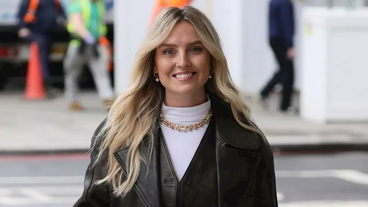 Perrie Edwards puts on a leggy display in a leather mini skirt while out in London as she continues...