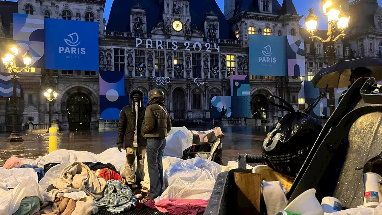 Paris police remove dozens of migrants from Paris City Hall 100 days before Olympic Games