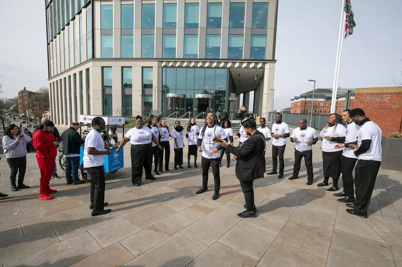 Choir Serenades Taxmen with Uplifting Music