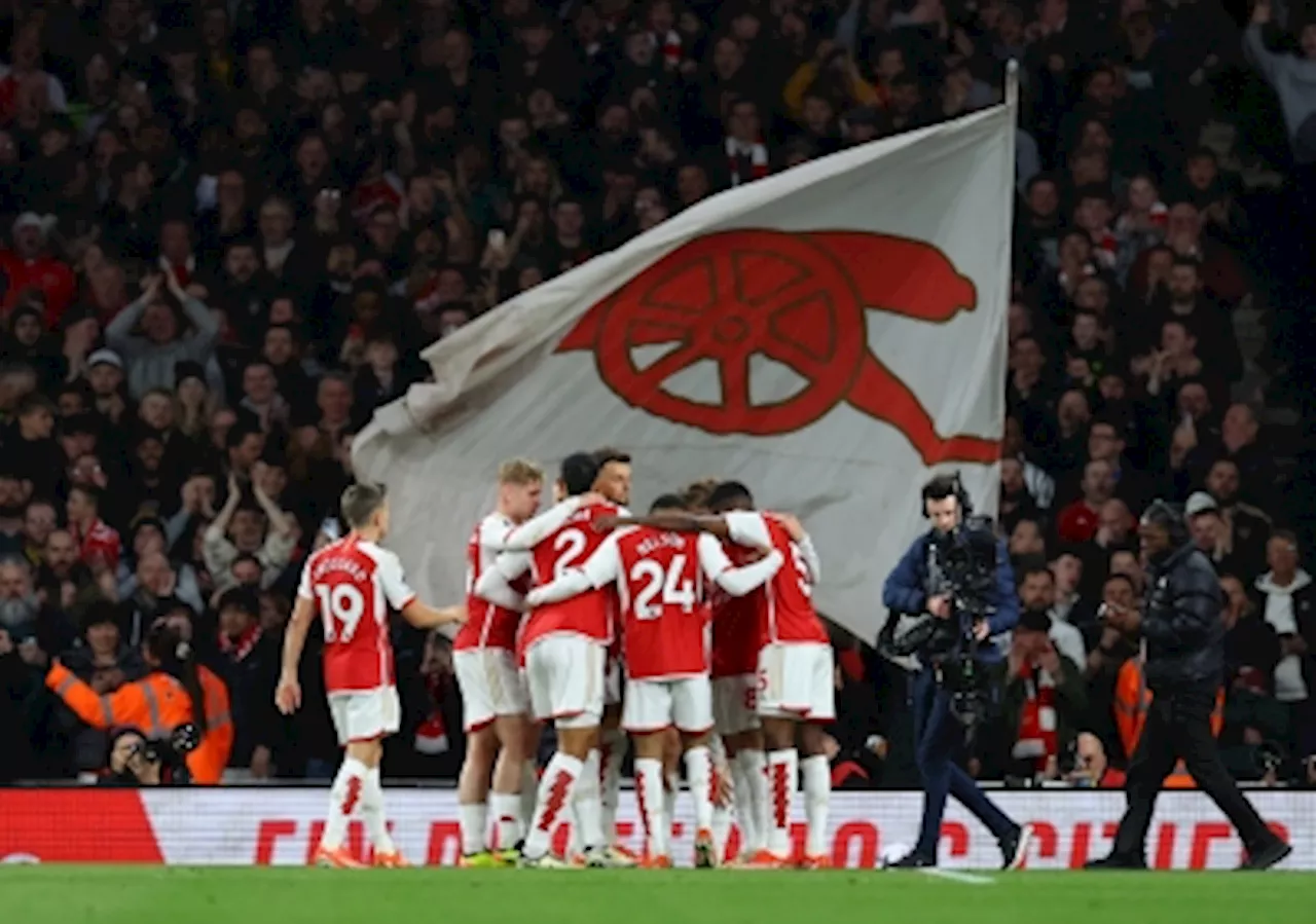 Arsenal reclaim top spot with comfortable win over Luton