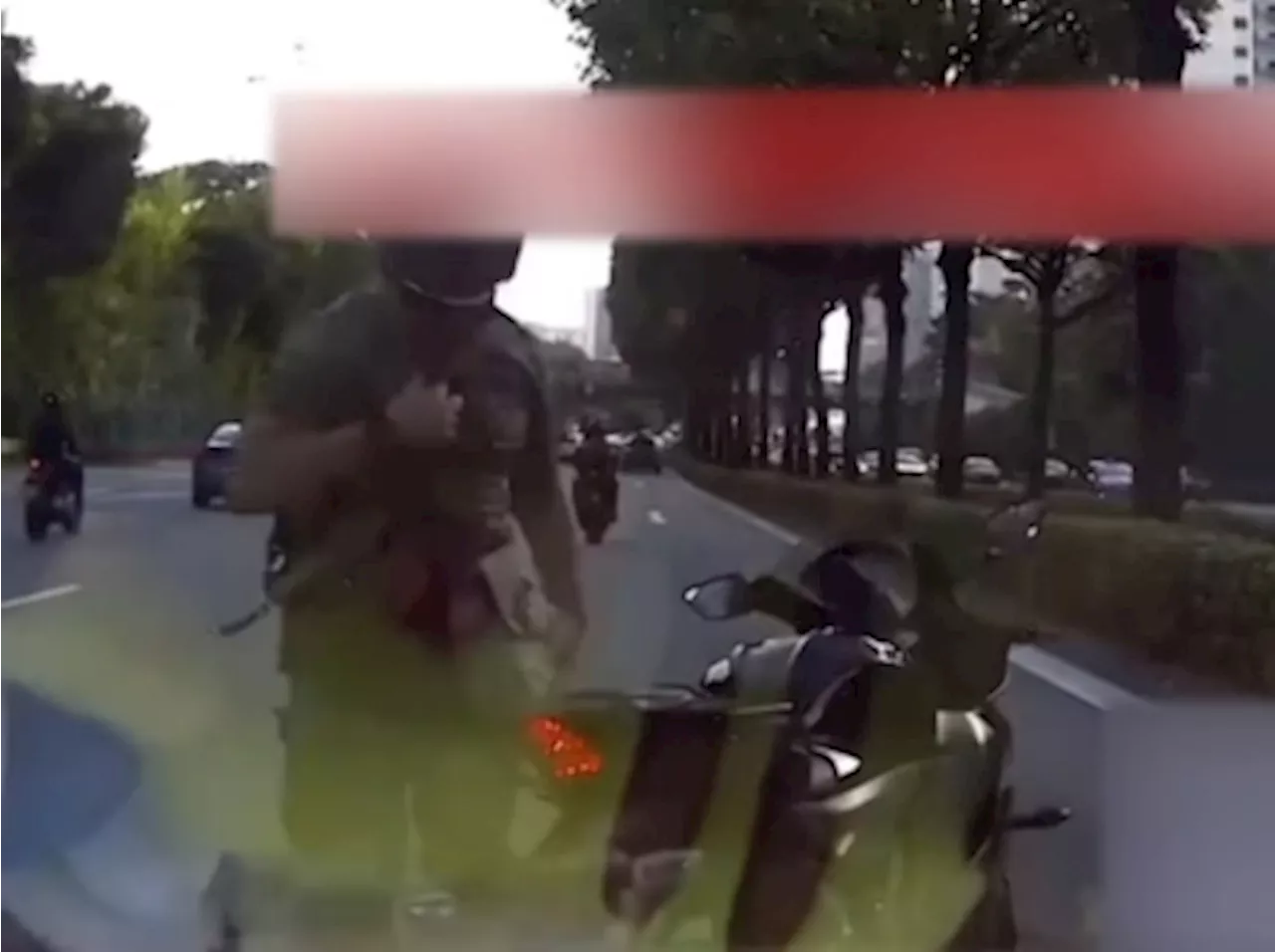 Singapore army files police report over motorcyclist filmed in PIE row claiming to be military policeman who could impound car