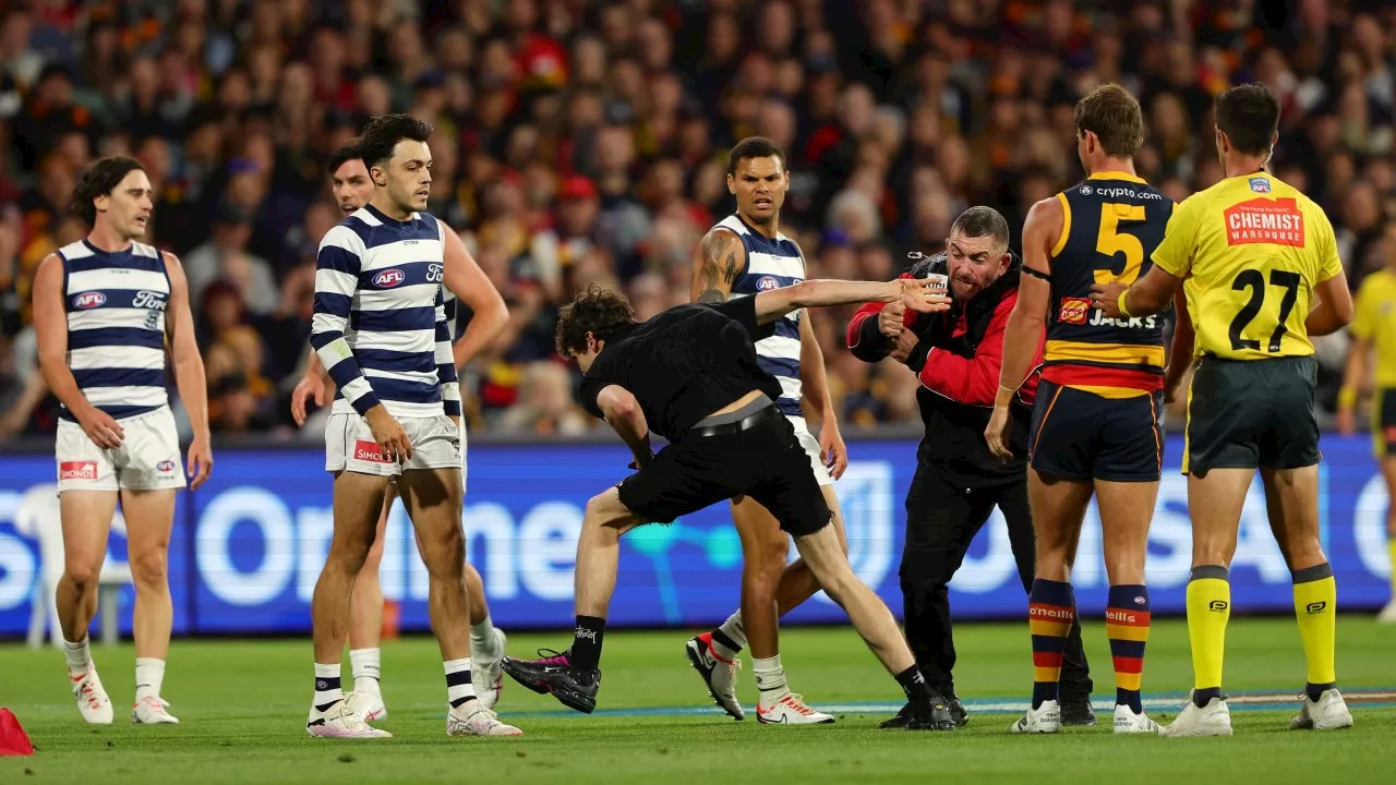 AFL issues stern message as pitch invader is handed lifetime ban