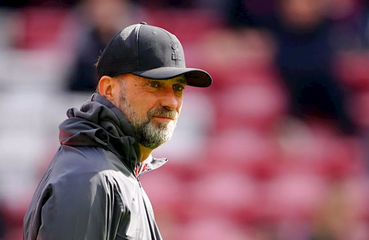 Jurgen Klopp urges Reds to ‘ignore outside mess’ as he plays down favourites tag