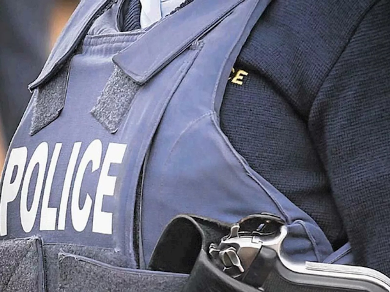 Police launch manhunt after scrapyard robbery shootout