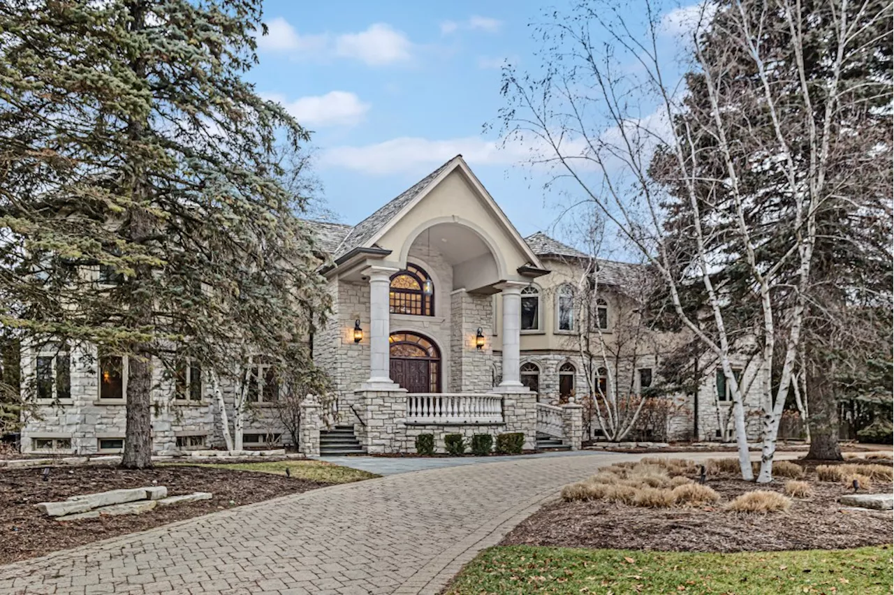 Northbrook 6-bedroom home with double-bridal staircase and model train room: $3.3M