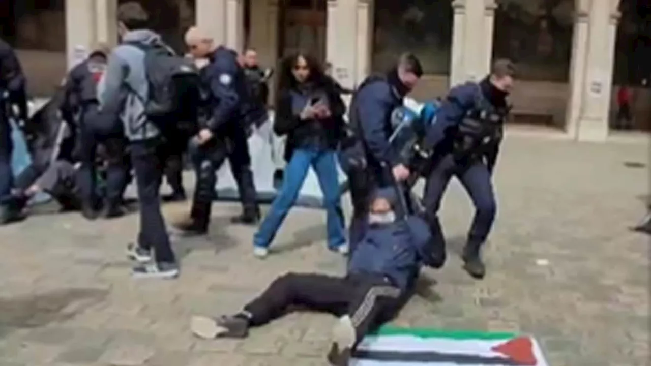 French cops drag pro-Palestinian protesters from their tents and dismantle their camp in operation...