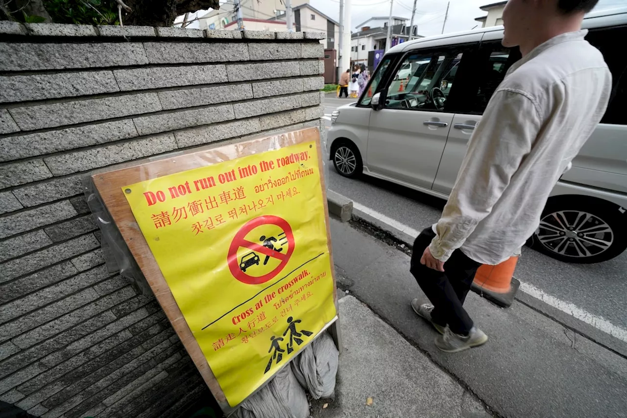 To fend off tourists, a town in Japan is building a big screen blocking the view of Mount Fuji