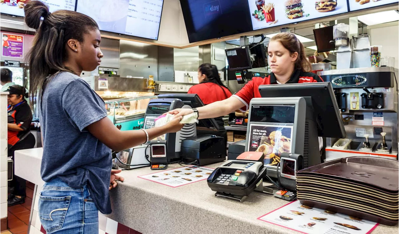 McDonald's and other big brands warn that low-income consumers are starting to crack