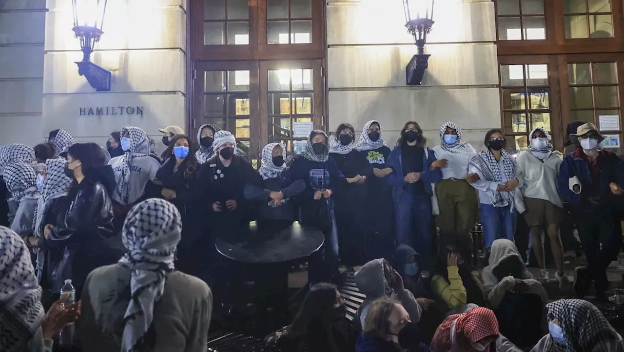 Pro-Palestinian demonstrators occupy building at Columbia University in escalation of anti-war protests