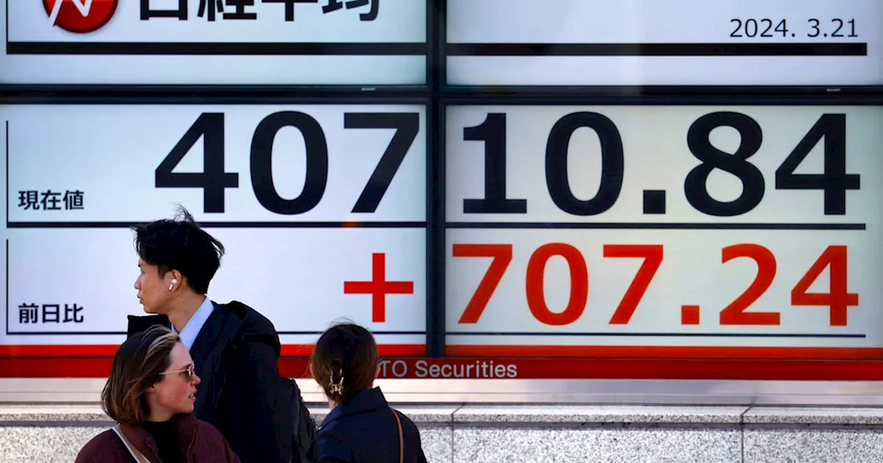 Stocks in Asia rise, yen wobbles after volatile start to week