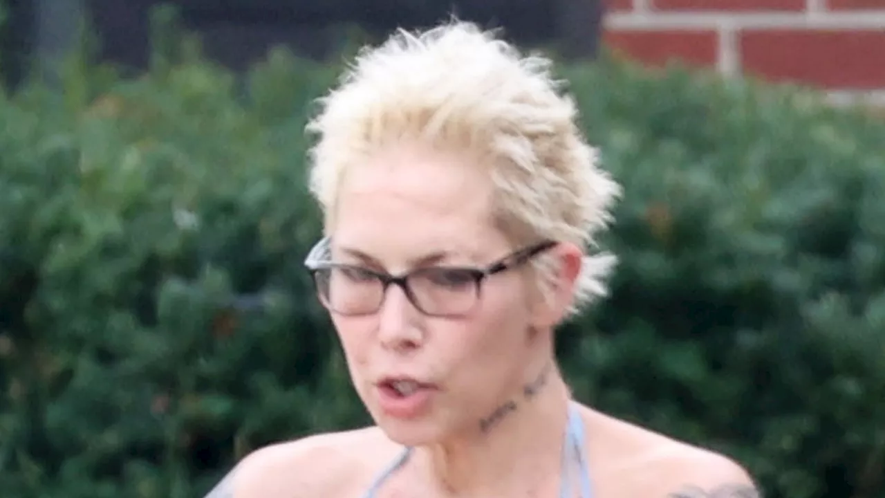 Eminem’s ex-wife Kim Mathers downsizes again as she puts $540k four-bed house on the market after buying o...