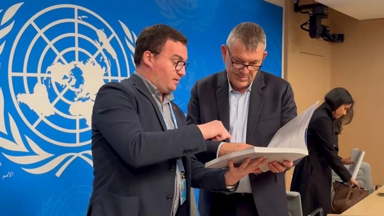 UNRWA chief examines Anadolu's book proving Israeli war crimes in Gaza