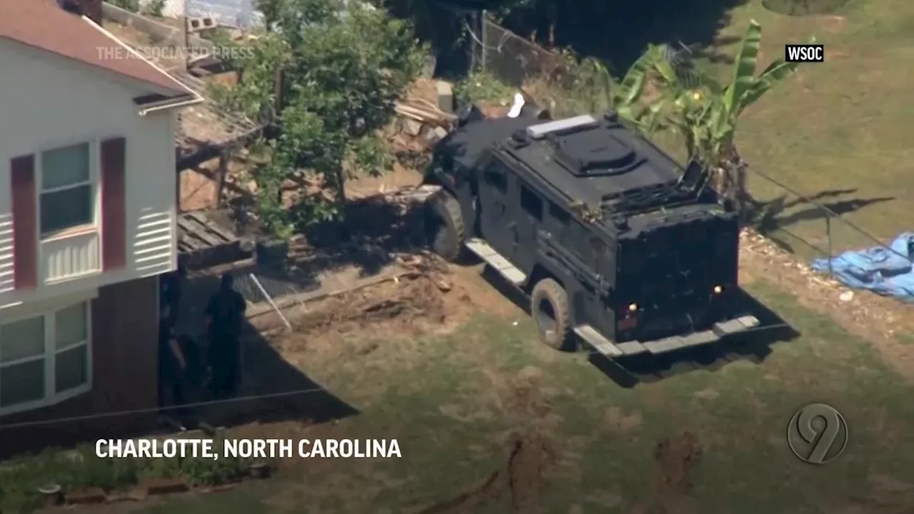 4 law officers serving warrant are killed, 4 wounded in shootout at North Carolina home, police say