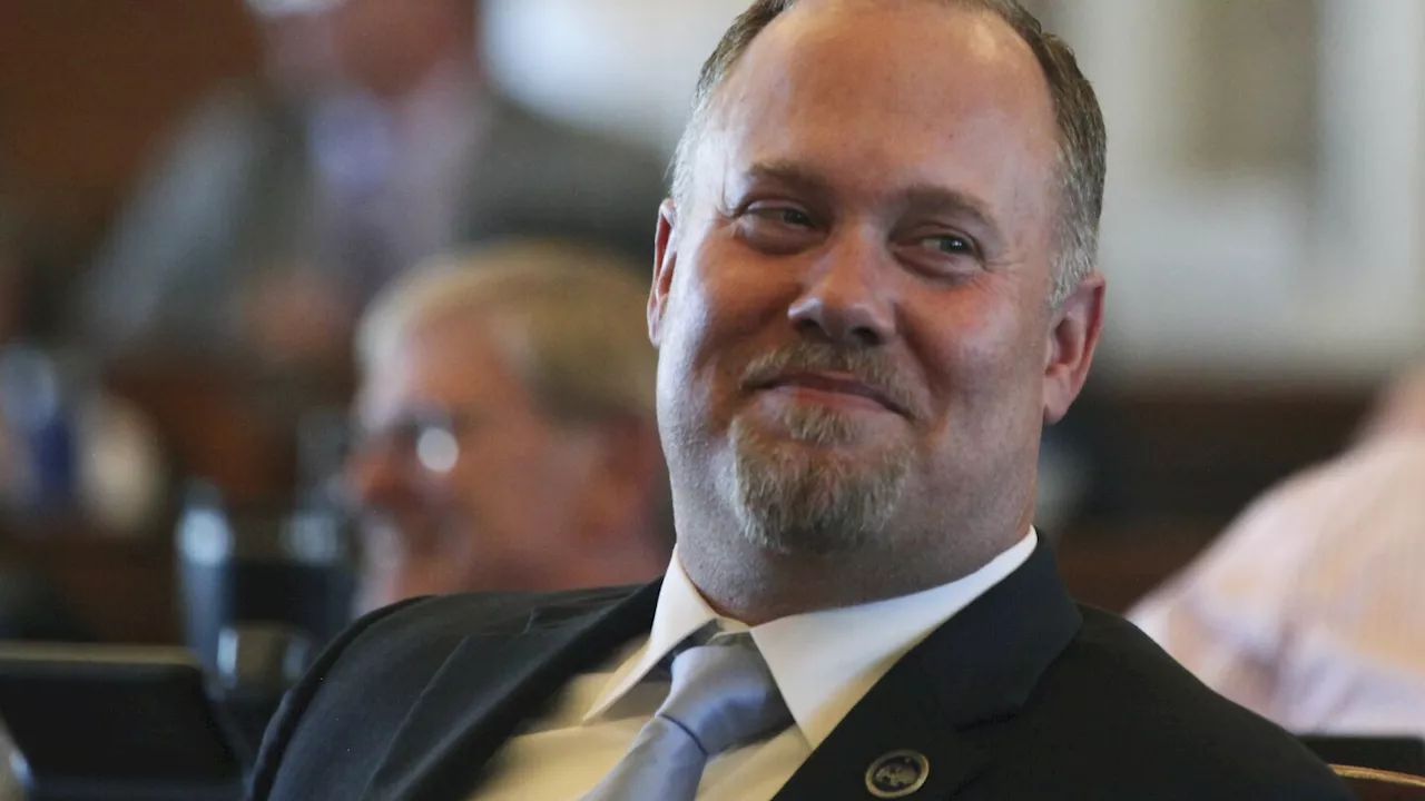Kansas' governor and GOP leaders have a deal on cuts after GOP drops 'flat' tax plan