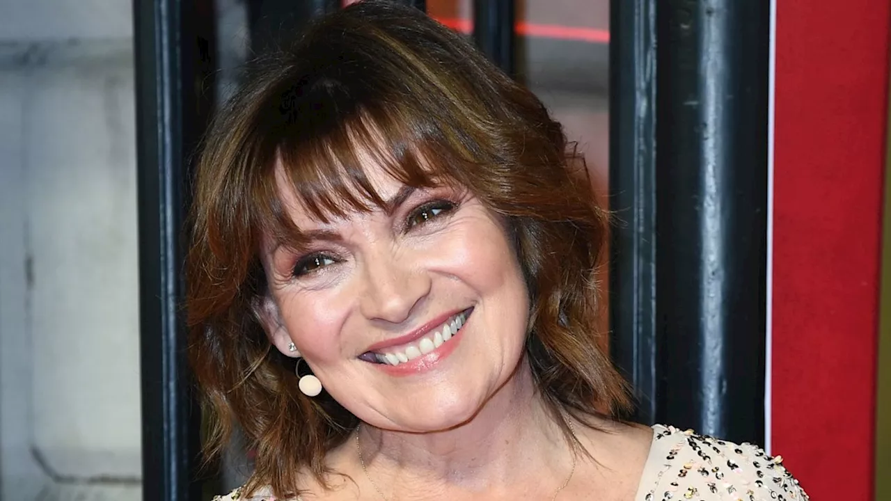 Beaming Lorraine Kelly rocks black bob and cascading veil in rare wedding photo with lookalike father