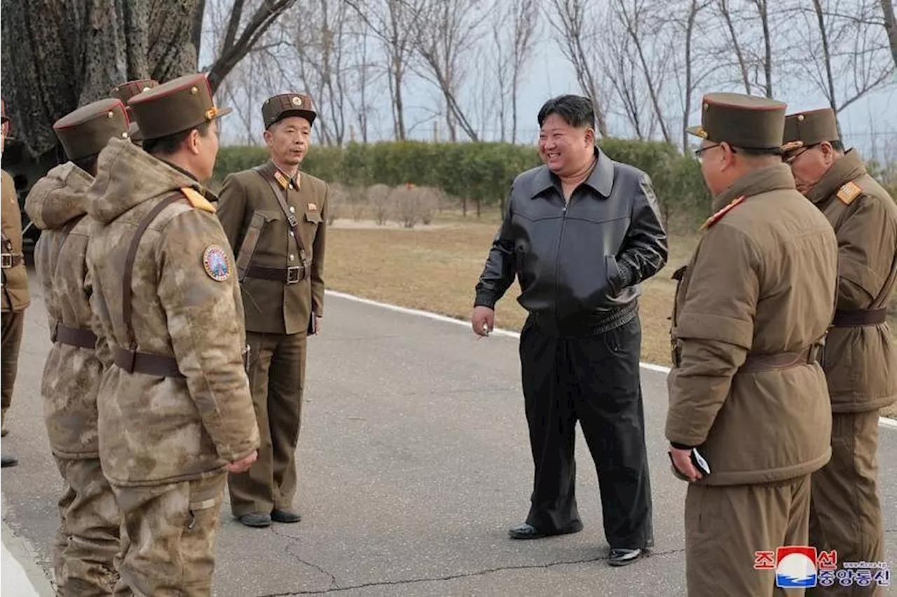 N.Korea’s Kim Jong-un leads test of new missile that can hit US bases