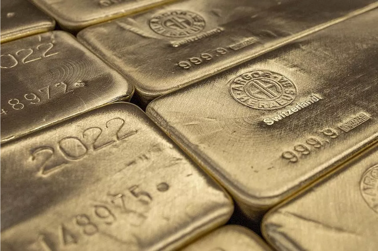 Gold sets another record high above US$2,300 after Powell comments