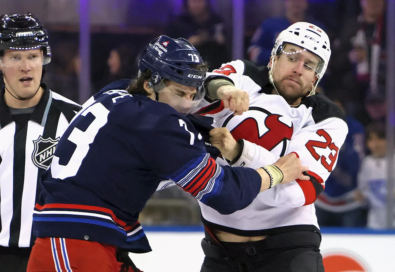 Rangers-Devils game erupts into 10-player brawl 2 seconds after opening faceoff; 8 ejected