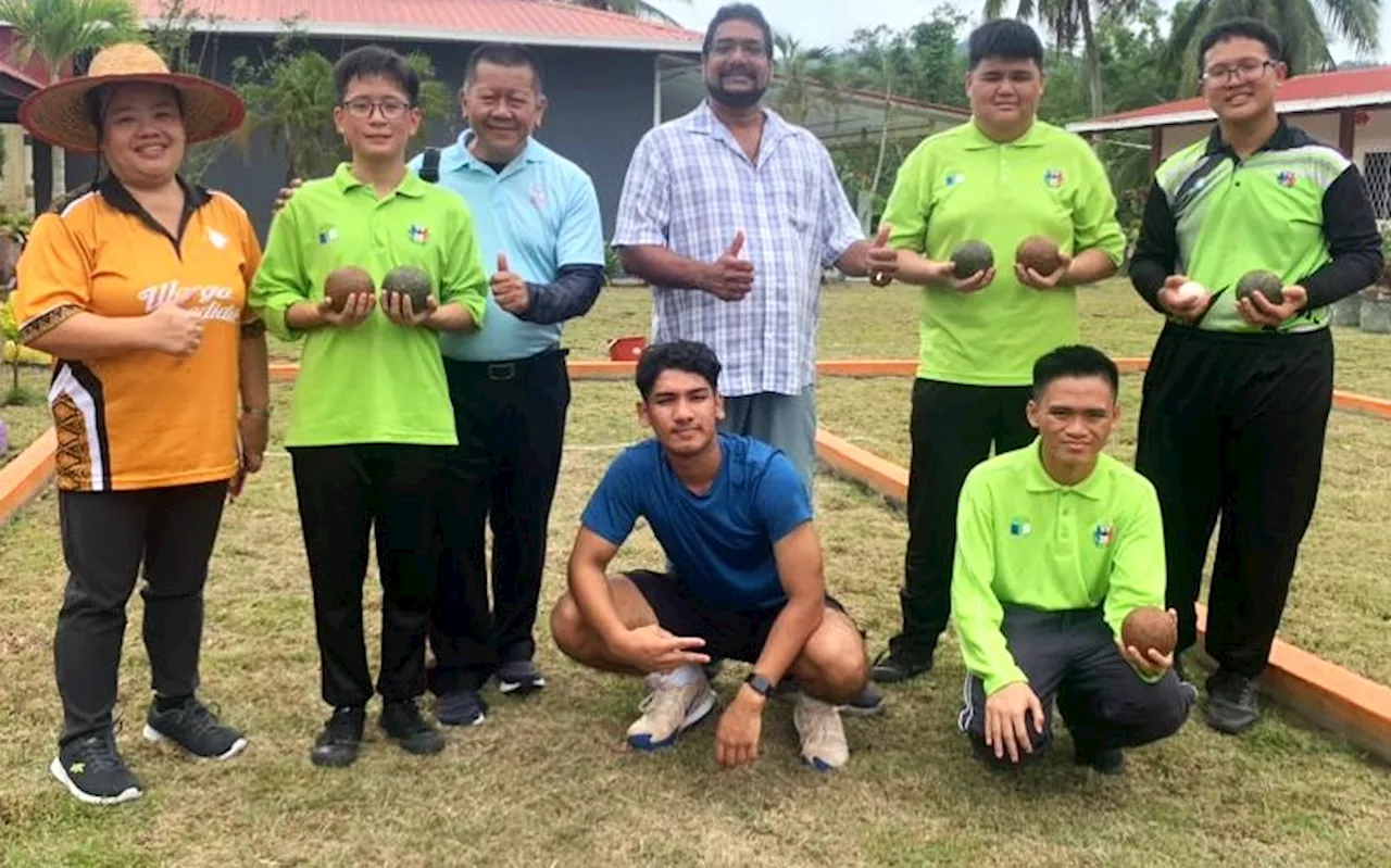 Helping Sandakan special kids in tennis