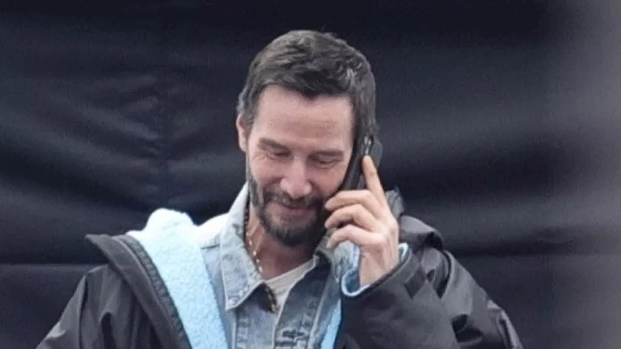 Keanu Reeves Takes a Break on Set of Dark Comedy Outcome