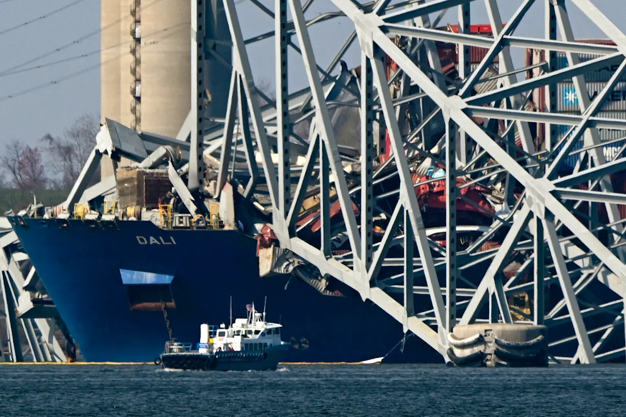 Engineers clearing collapsed Baltimore bridge say limited-access channel to port to open in 4 weeks