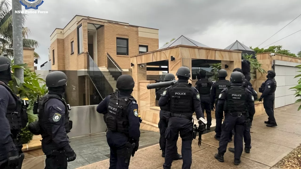 Dramatic police raid sees dozens of cops descend on Sydney’s inner west